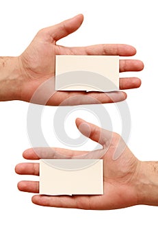 Two business cards in hands