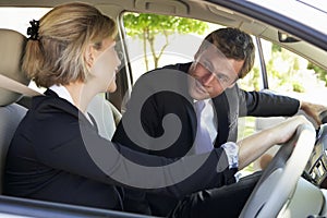 Two Business Colleagues Car Pooling Journey Into Work