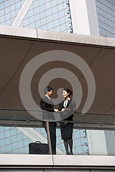 Two Business Colleagues Having Discussion