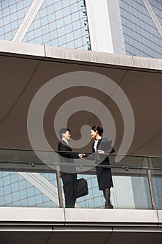 Two Business Colleagues Shaking Hands