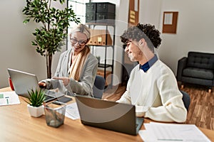 Two business executives working at the office