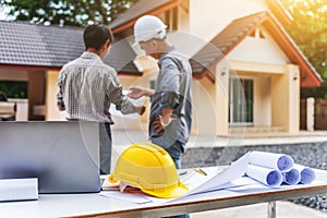 Two business man professional engineer worker at the house building