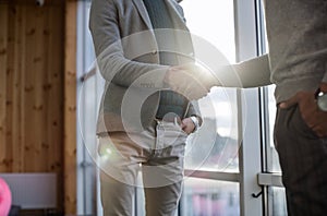 Two Business Man Shake Hand Agreement Coworking Center Business Team Coworkers Stand In Front Big Panoramic Window