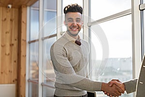 Two Business Man Shake Hand Agreement Coworking Center Business Team Coworkers Stand in front Big Panoramic Window