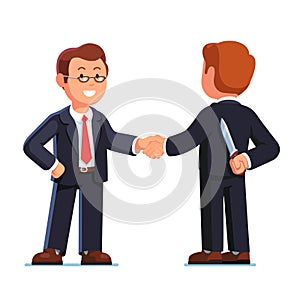 Two business man shaking hands. Betrayal metaphor.