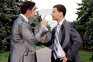 Two business men arguing