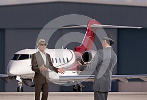 Two business men meeting at the executive airport