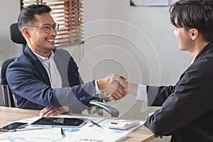 two business men shake hands for business cooperation