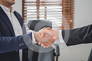 two business men shake hands for business cooperation