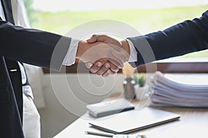 two business men shake hands for business cooperation