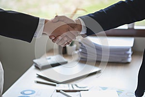 two business men shake hands for business cooperation