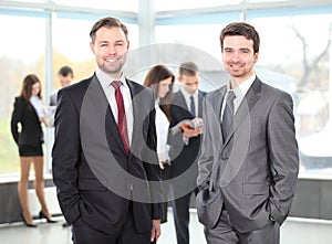 Two business men working together