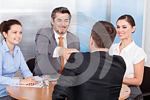 Two Business Partner Shaking Hands