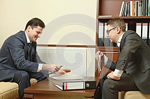 Two business people direct negotiations in the office photo