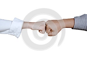 Two business people doing fist bump