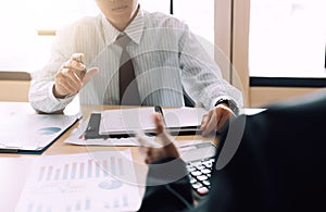 Two business people having discussion in the office room.