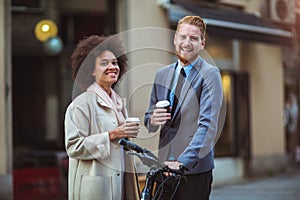 Two business people in an informal conversation