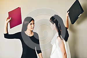 Two business women have conflicts in the workplace, they are hit