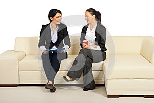 Two business women having conversation