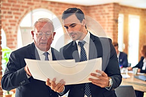 Two business workers working together