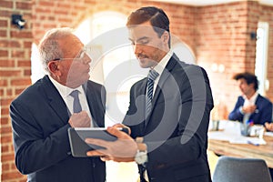 Two business workers working together