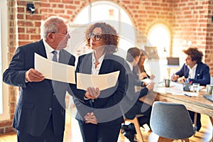 Two business workers working together