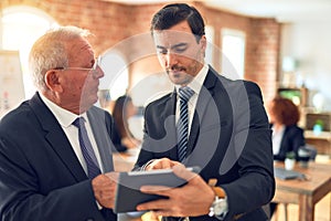 Two business workers working together