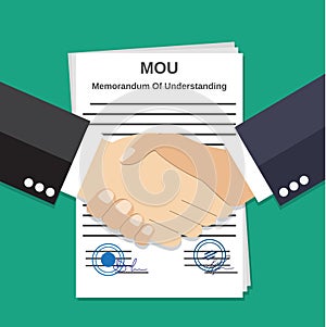 Two Businessman handshake on mou memorandum