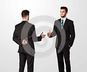 Two businessman shake hands