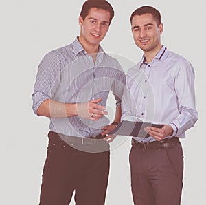 Two Businessman standing on a white background