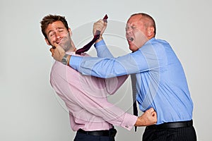 Two businessmen brawling