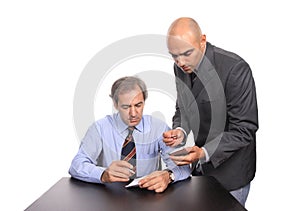 Two businessmen at desk