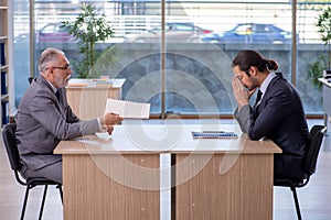 Two businessmen discussing business project