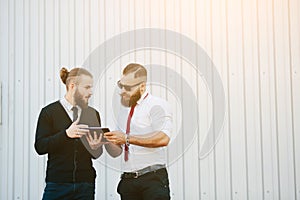 Two businessmen discussing something