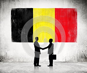 Two Businessmen With Flag of Belgium