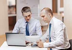 Two businessmen having discussion in office