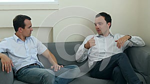 Two businessmen having discussion in office.