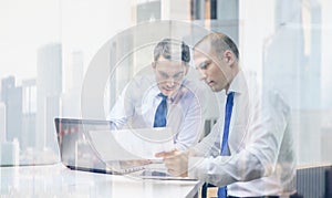 Two businessmen having discussion in office