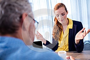 Two businessmen interacting