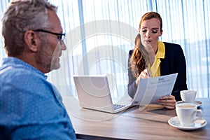 Two businessmen interacting