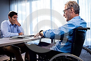 Two businessmen interacting