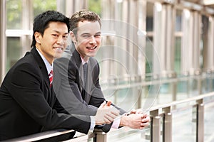 Two Businessmen Outside Modern Office