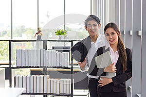 Two businessmen resting and talking in the office