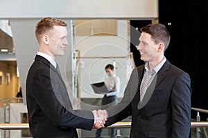 Two businessmen shaking hands