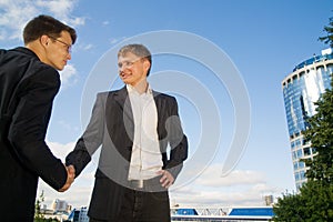 Two businessmen shaking hands