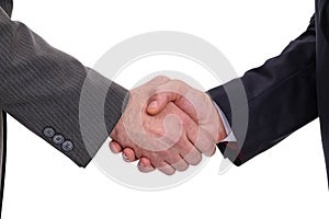 Two businessmen shaking hands with a firm handshake, isolated on