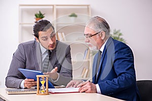 Two businessmen in time management concept