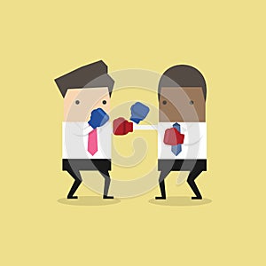 Two businessmen wearing boxing gloves fighting.