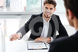 Two businessmen working on business meeting in office