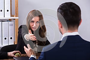 Two Businesspeople Having Conversation